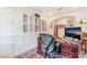 Comfortable office with built-in cabinets and large wooden desk at 10438 Skye Arroyo Ave, Las Vegas, NV 89166