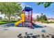 Colorful playground with slide, stairs, and shaded area for enjoyment at 1272 Olivia Pkwy, Henderson, NV 89011