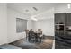 Stylish dining room features gray walls, gray cabinetry, recessed lighting, and a sleek modern table set at 1601 W Calvada Blvd, Pahrump, NV 89048