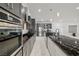 Modern kitchen with stainless steel appliances, a stylish island, and ample countertop space at 1601 W Calvada Blvd, Pahrump, NV 89048