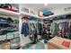 Spacious walk-in closet offers ample storage with shelves and hanging rods at 1601 W Calvada Blvd, Pahrump, NV 89048