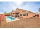 Well maintained backyard with a refreshing pool and low-maintenance desert landscaping at 172 Turtle Ridge Ave, Las Vegas, NV 89183