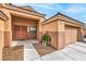 Close up view of a single-story house, with desert landscaping and a well kept front yard at 172 Turtle Ridge Ave, Las Vegas, NV 89183