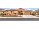 Charming single-story home with a well-manicured lawn and a two-car garage on a sunny day at 172 Turtle Ridge Ave, Las Vegas, NV 89183