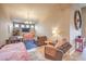 Inviting living room with cozy seating, stylish decor, and warm lighting at 172 Turtle Ridge Ave, Las Vegas, NV 89183