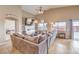 Relaxing living room with plush sofa, large windows, and access to outdoor space at 172 Turtle Ridge Ave, Las Vegas, NV 89183
