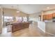 Bright open-concept living area with vaulted ceiling, with seamless flow into the dining and kitchen areas at 172 Turtle Ridge Ave, Las Vegas, NV 89183