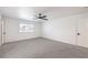 Neutral primary bedroom featuring a ceiling fan and ample natural light at 1942 Hallwood Dr, Las Vegas, NV 89119