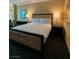 Cozy hotel bedroom featuring a plush king bed, a sleek desk, and soft lighting at 2000 N Fashion Show Dr # 1728, Las Vegas, NV 89109