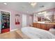 Bright bathroom features a soaking tub, double vanities and a private water closet at 2212 Barton Mill Ct, North Las Vegas, NV 89084