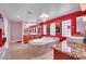 Luxurious bathroom showcasing a soaking tub, double vanities and a glass block window at 2212 Barton Mill Ct, North Las Vegas, NV 89084