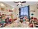 Playful bedroom with bright colors, fun decor, and an abundance of toys at 2212 Barton Mill Ct, North Las Vegas, NV 89084