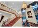 Grand foyer featuring staircase, chandelier, and view of second story at 2212 Barton Mill Ct, North Las Vegas, NV 89084