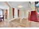 Welcoming foyer with tiled floors, staircase, and traditional decor elements at 2212 Barton Mill Ct, North Las Vegas, NV 89084