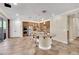 Spacious kitchen with stainless steel appliances, large island with seating, and tiled floor at 2212 Barton Mill Ct, North Las Vegas, NV 89084