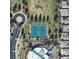 Aerial view of community tennis courts and clubhouse offering recreational amenities for residents at 2212 Barton Mill Ct, North Las Vegas, NV 89084
