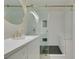 Modern bathroom with a glass shower, stylish honeycomb tile, and gold fixtures at 2251 Wigwam Pkwy # 716, Henderson, NV 89074
