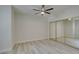 Spacious bedroom features mirrored closet doors, neutral walls, and a ceiling fan at 2251 Wigwam Pkwy # 716, Henderson, NV 89074