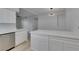 Modern kitchen with stainless steel appliances, quartz countertops, and white cabinetry at 2251 Wigwam Pkwy # 716, Henderson, NV 89074