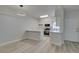 Bright and modern kitchen flows into the dining area, featuring white cabinetry at 2251 Wigwam Pkwy # 716, Henderson, NV 89074