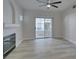 Bright living room features a fireplace, ceiling fan, and patio access at 2251 Wigwam Pkwy # 716, Henderson, NV 89074