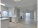 Spacious open floor plan combines kitchen and living area with fireplace and modern ceiling fan at 2251 Wigwam Pkwy # 716, Henderson, NV 89074