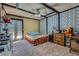 Cozy bedroom with unique wallpaper and a comfortable bed, creating a personalized and inviting retreat at 2375 Rawhide St, Las Vegas, NV 89119