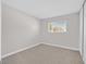 Bedroom showcasing the carpeted floors, window with blinds and light grey walls at 2402 El Cid Ct, Henderson, NV 89014