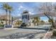 The attractive gated community entrance is enhanced by lush landscaping, offering both security and curb appeal at 2405 Esteem Ridge Dr, Henderson, NV 89052