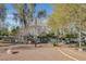 Scenic community grounds with walking paths and mature trees, offering a peaceful setting at 2405 Esteem Ridge Dr, Henderson, NV 89052