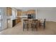 Charming kitchen featuring granite counters, stainless appliances, and a spacious center island at 2405 Esteem Ridge Dr, Henderson, NV 89052