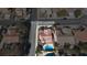 Aerial view of a well-maintained home with a private pool in a desirable neighborhood at 2529 Vera Cruz Cir, Henderson, NV 89074