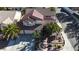 This aerial view shows a landscaped front yard, driveway, and tile roof at 2529 Vera Cruz Cir, Henderson, NV 89074