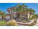 Charming two-story home with a well-manicured front yard and desert landscaping at 2529 Vera Cruz Cir, Henderson, NV 89074