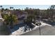 Charming two-story home features beautiful landscaping, mature palm trees, and a spacious concrete driveway at 2529 Vera Cruz Cir, Henderson, NV 89074
