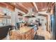 Contemporary kitchen with a center island, stainless steel appliances, and wood accents at 2529 Vera Cruz Cir, Henderson, NV 89074
