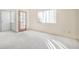 Neutral bedroom with carpet, and large windows at 2647 Jacyra Ave, Las Vegas, NV 89121