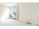 Bedroom with neutral walls, carpet, and a sliding door with access to a balcony at 2647 Jacyra Ave, Las Vegas, NV 89121