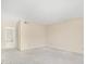 Spacious bedroom with neutral walls, carpeted floor, and an open doorway to the bathroom at 2647 Jacyra Ave, Las Vegas, NV 89121