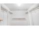 Walk-in closet featuring shelves, rods, and white fixtures, offering ample storage space at 2647 Jacyra Ave, Las Vegas, NV 89121