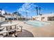 Enjoy a refreshing swim in the community pool, surrounded by lush landscaping and ample seating at 2647 Jacyra Ave, Las Vegas, NV 89121