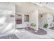 View of the unit's front door and porch area with an exterior number displayed at 2647 Jacyra Ave, Las Vegas, NV 89121