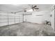 Spacious garage with an automatic door and concrete floors at 2647 Jacyra Ave, Las Vegas, NV 89121