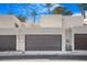Attached garages provide convenient parking and additional storage in this well-maintained community at 2647 Jacyra Ave, Las Vegas, NV 89121