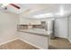 Kitchen featuring stainless steel appliances, granite countertop and a breakfast bar at 2647 Jacyra Ave, Las Vegas, NV 89121