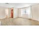 Bright living room showcasing a decorative window front door and a window at 2647 Jacyra Ave, Las Vegas, NV 89121