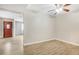 Welcoming living room with ceiling fan, hardwood floors and open design at 2647 Jacyra Ave, Las Vegas, NV 89121