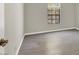 Neutral bedroom showcasing ample natural light and gray wood-look flooring and neutral paint at 2966 Juniper Hills Blvd # 204, Las Vegas, NV 89142