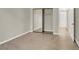 A bright bedroom features wood-look flooring and a mirrored closet at 2966 Juniper Hills Blvd # 204, Las Vegas, NV 89142
