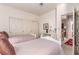 Bright bedroom with twin beds, a large closet, and access to the hallway at 3098 Quail Crest Ave, Henderson, NV 89052